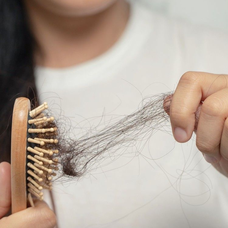Why Is My Hair Falling Out? Understanding the Root Causes of Shedding